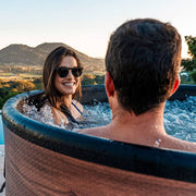 Couple enjoying session in hot tub